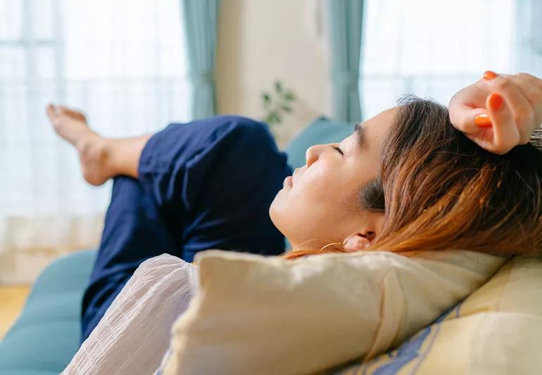 woman napping on the couch