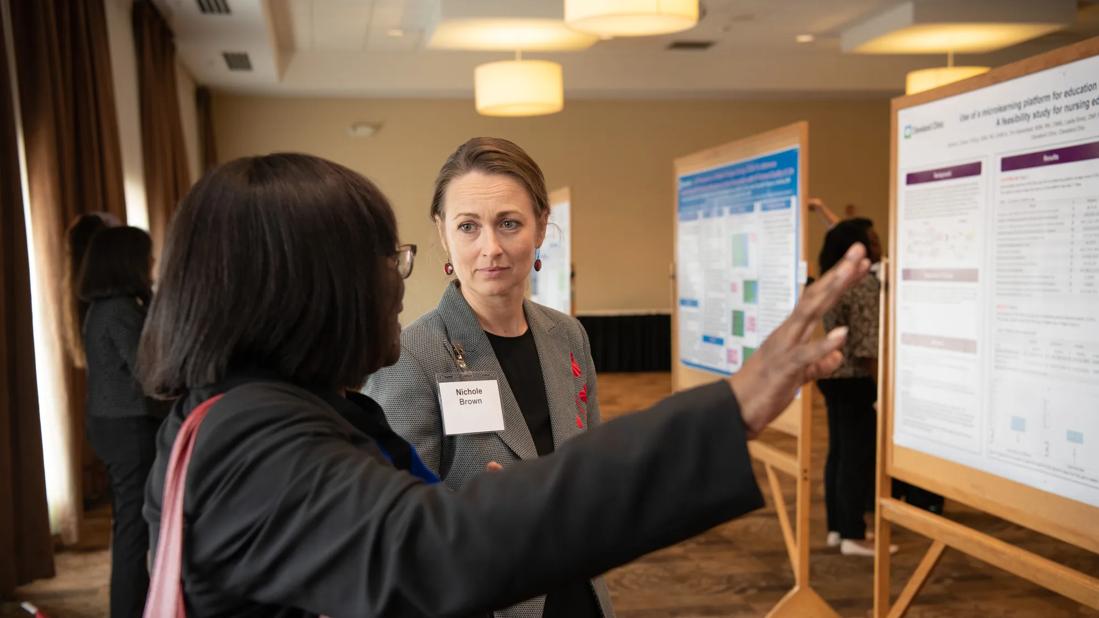 Nurses at nursing conference, poster presentation