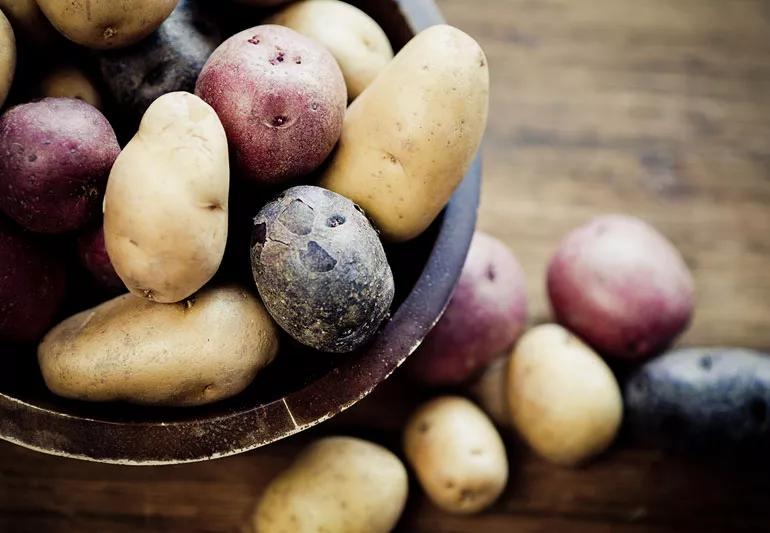 Different kinds of potatoes in a bowl