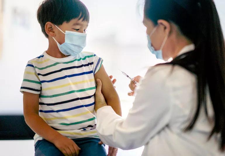 child getting immunized