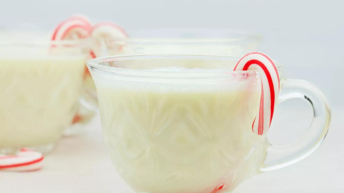 Delicious eggnog with mini candy canes