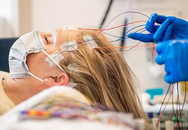 scalp EEG electrodes on a woman's head