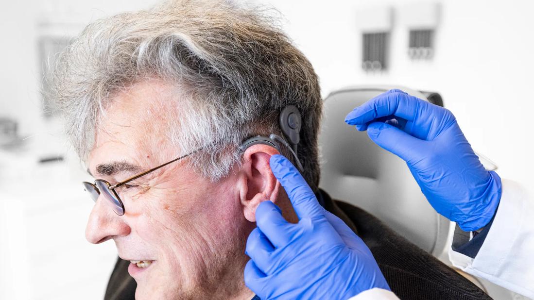 Patient being fitted with cochlear implants