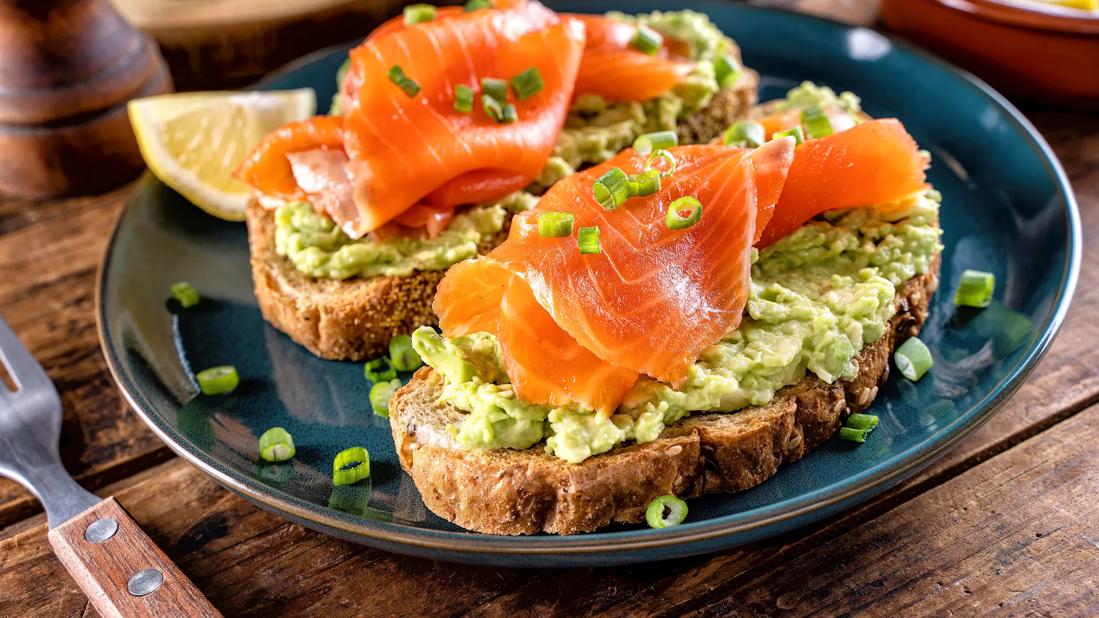 Salmon avovado toast on a plate