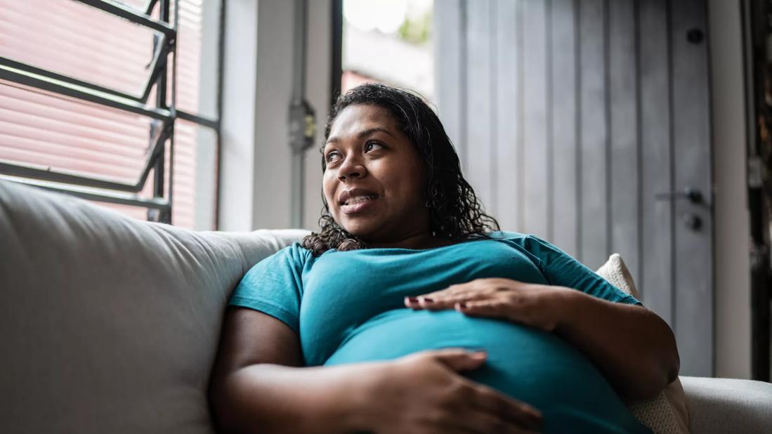 pregnant woman seated