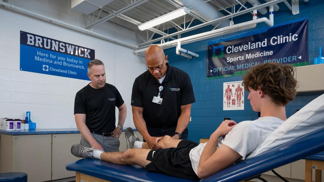 Dr. Farrow examining patient