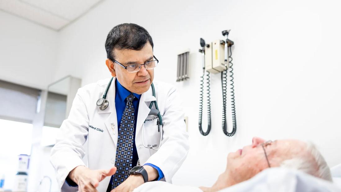 Dr. Chatterjee with patient