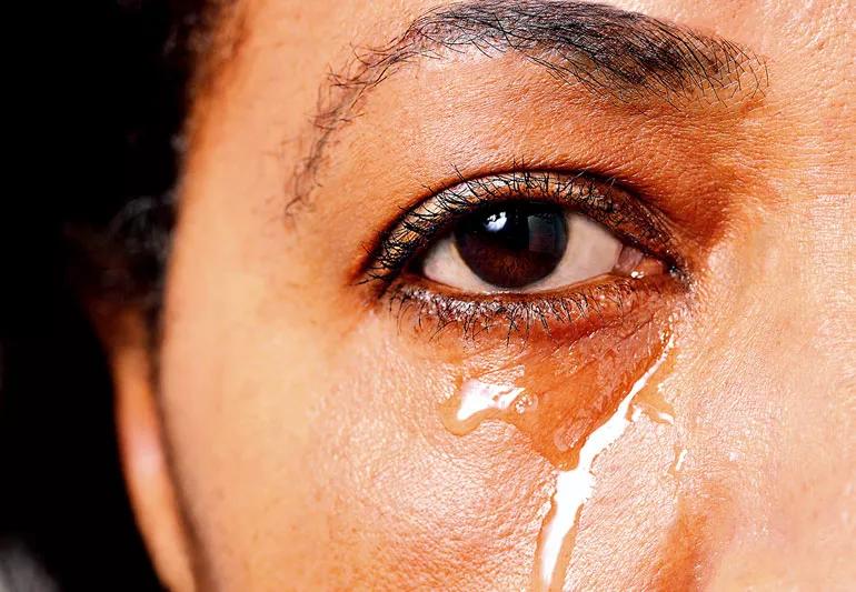 closeup of woman crying