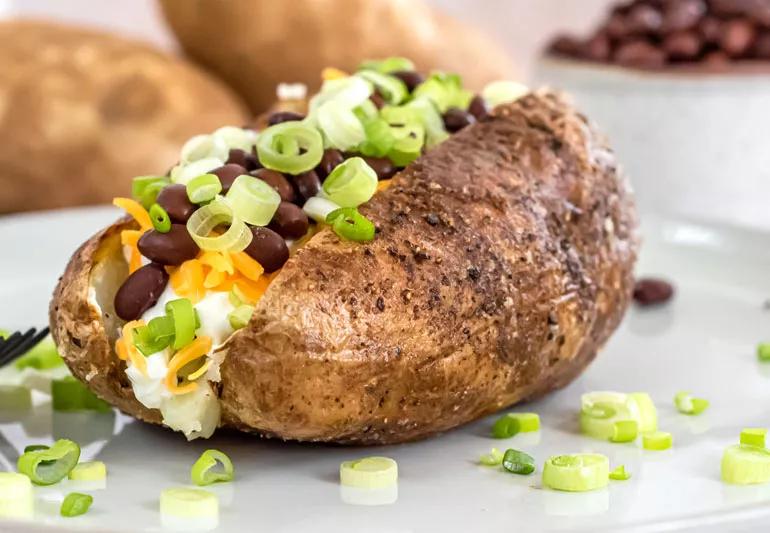 Baked potato with black beans.