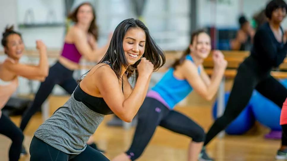 group of people doing an aerobics class