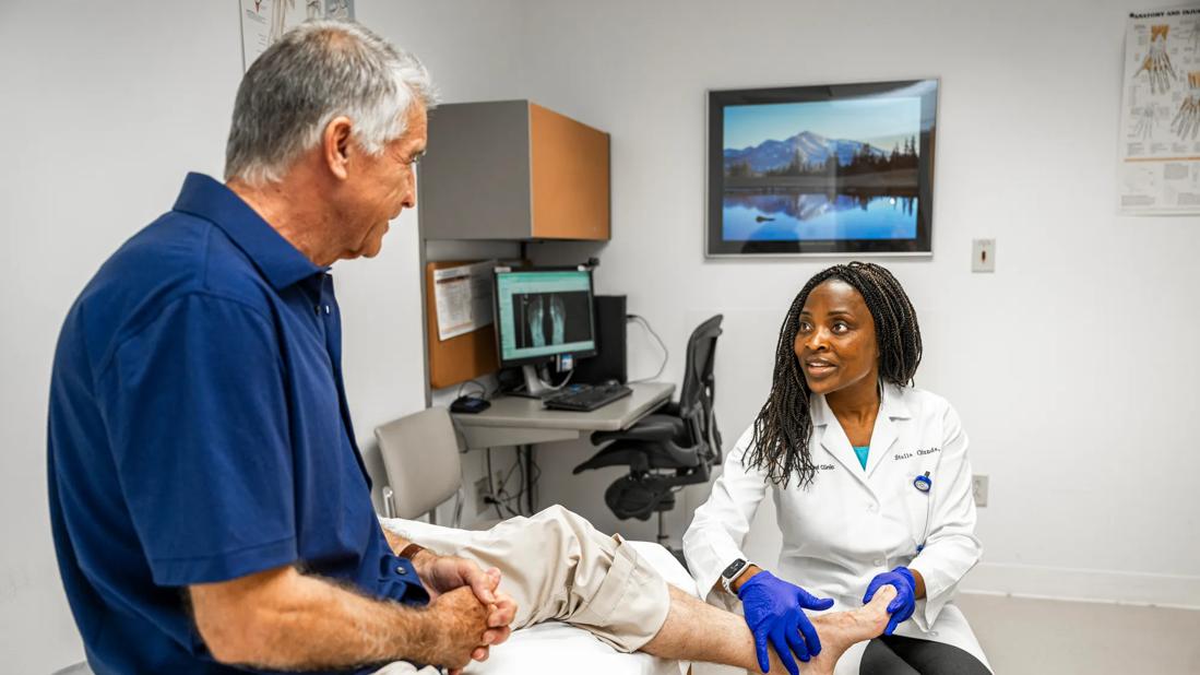 Doctor examining patient's foot