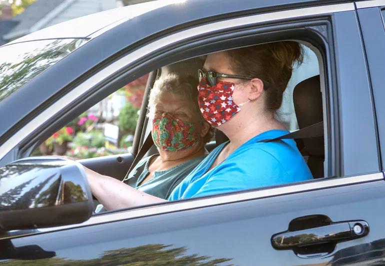 wearing face masks in car