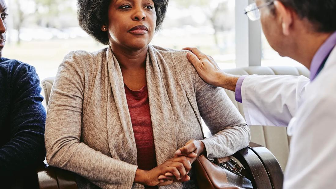 Doctor speaking with patient