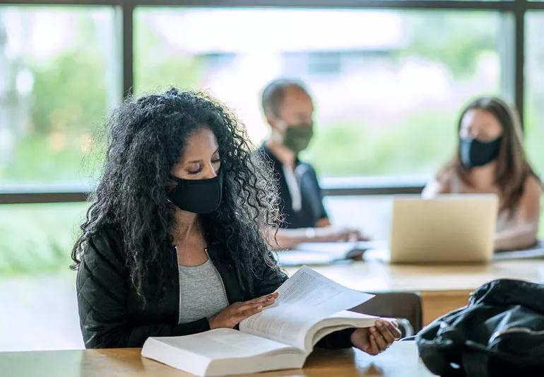 college students studying in library