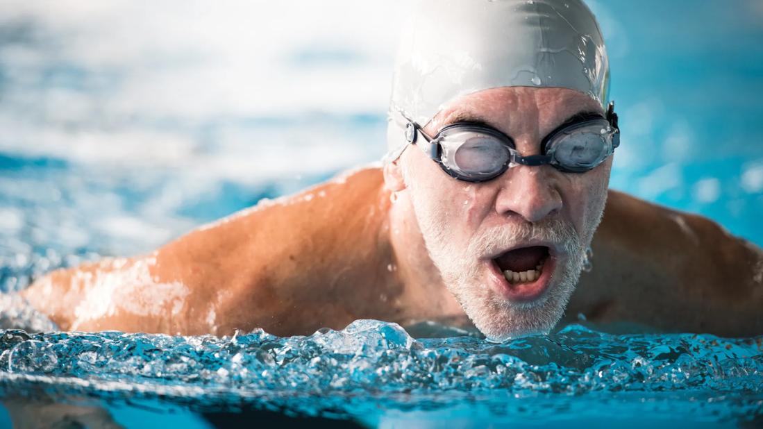 Adult swimming in pool