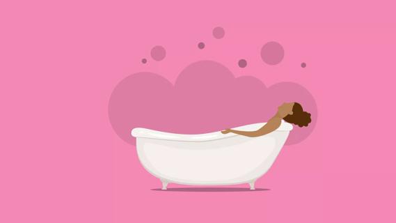 female soaking in a tub