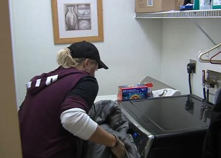 Person doing laundry