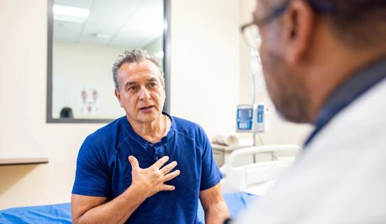 Older patient talking with healthcare provider