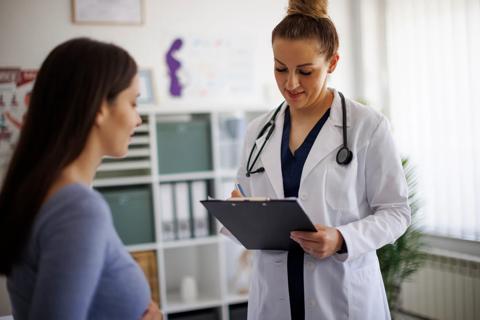 Woman talking with Ob/Gyn