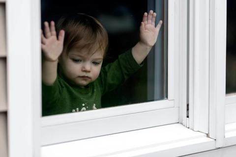 Child at window