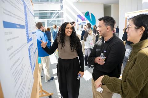 Students gather to look at presentations at the 2026 CCLCM Research Day