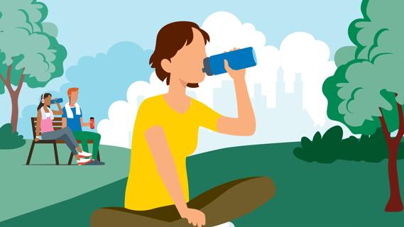 Person sitting on grass in park, drinking from reusable water bottle, with people on bench with reusable water bottles