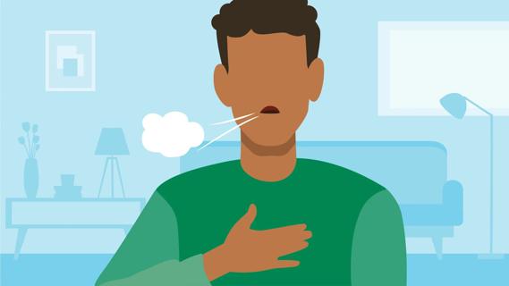 Man with hand on chest, wheezing