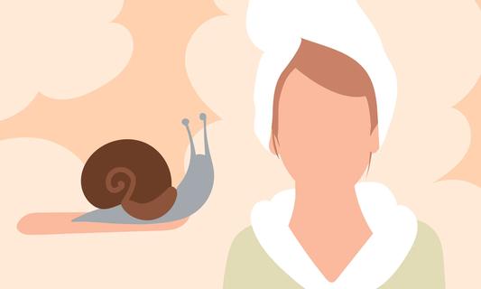 Oversized snail and person with towel o