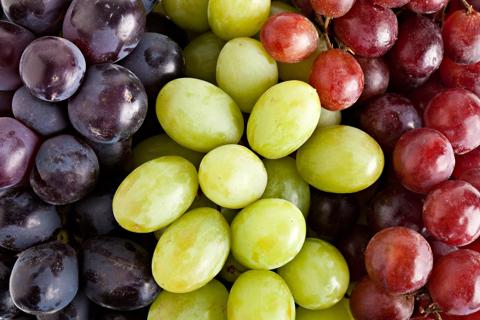 Three bunches of three types of grapes
