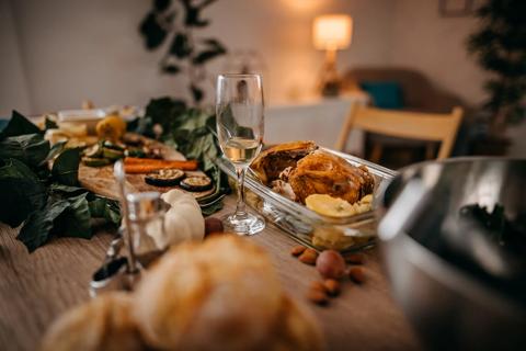 Table with remnants of a meal, leftover food