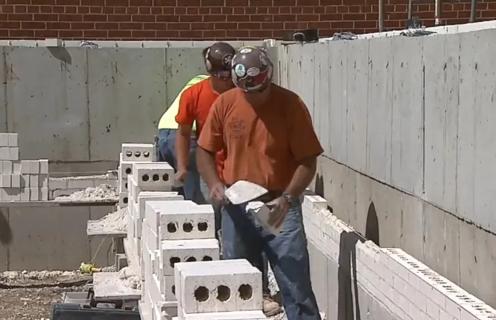 Men working in the heat