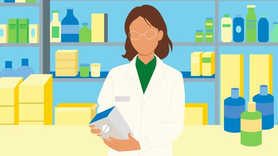 Pharmacy provider holding container of aspirin