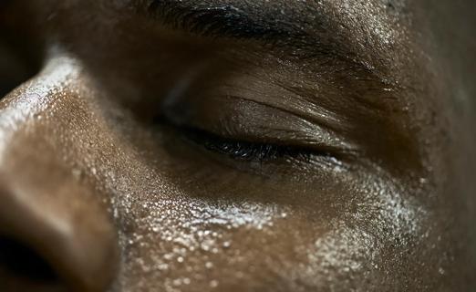 Close up of face, sweating, eyes closed