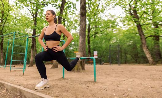 Person doing a Bulgarian-split squat outside