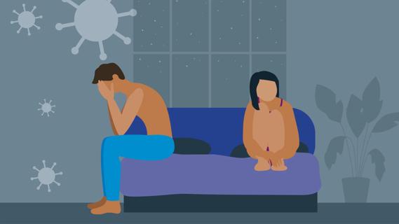 Male sitting on edge of bed with head in hands, distressed, with female sitting in bed, with germs floating around