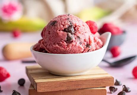 cherry chocolate ice cream in a bowl