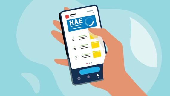 Hand holding smartphone displaying HAE app