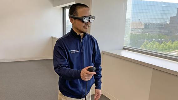 Man demonstrating augmented reality tool for gait freezing