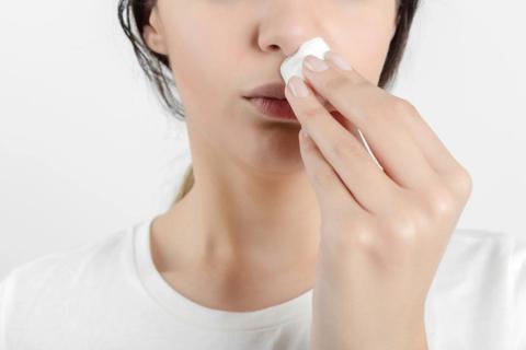 Photo illustration of a nose bleed