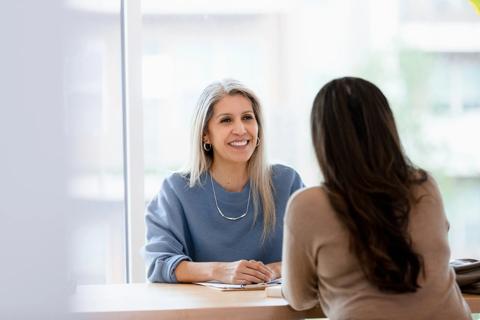 Employee speaking with manager