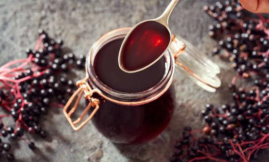 Fresh elderberries and elderberry syrup