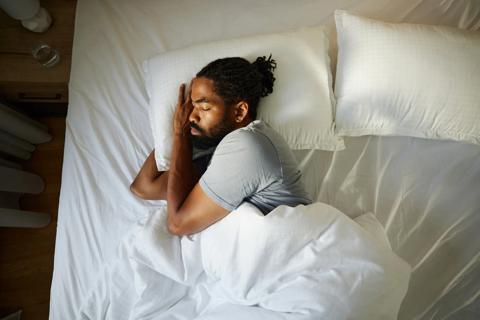 Person in bed sleeping