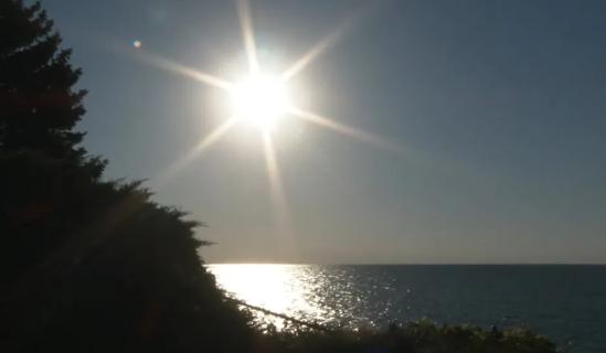 Sun over lake