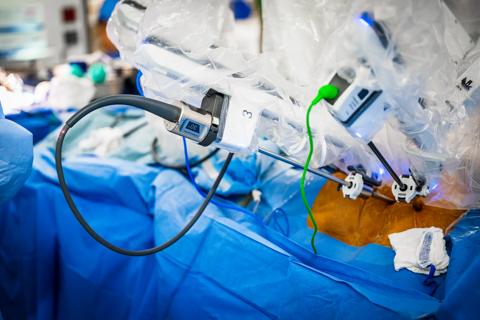 robotic arm ports in a cardiac surgery operation