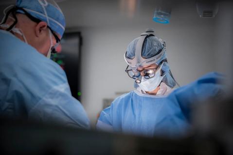 Surgeon looking down in the operating room