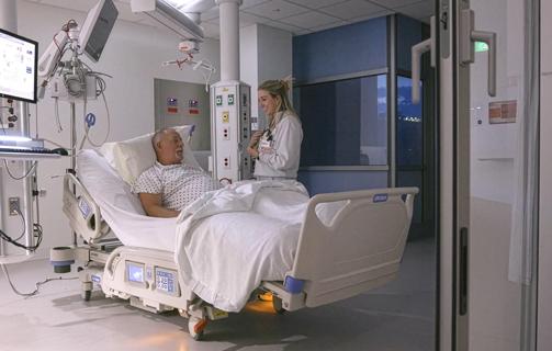 Night-shift nurse with patient