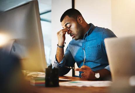 man suffering from tension headache