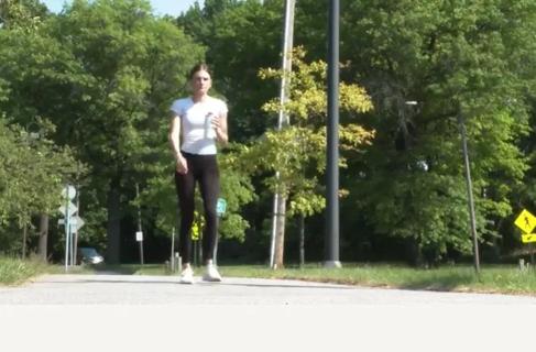 Woman walking outdoors