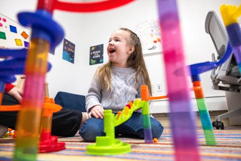 Child playing with toys