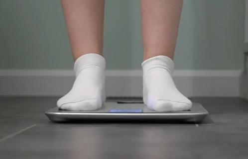 Person standing on scale